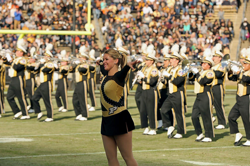Emma performing at half time at a Purdue football game