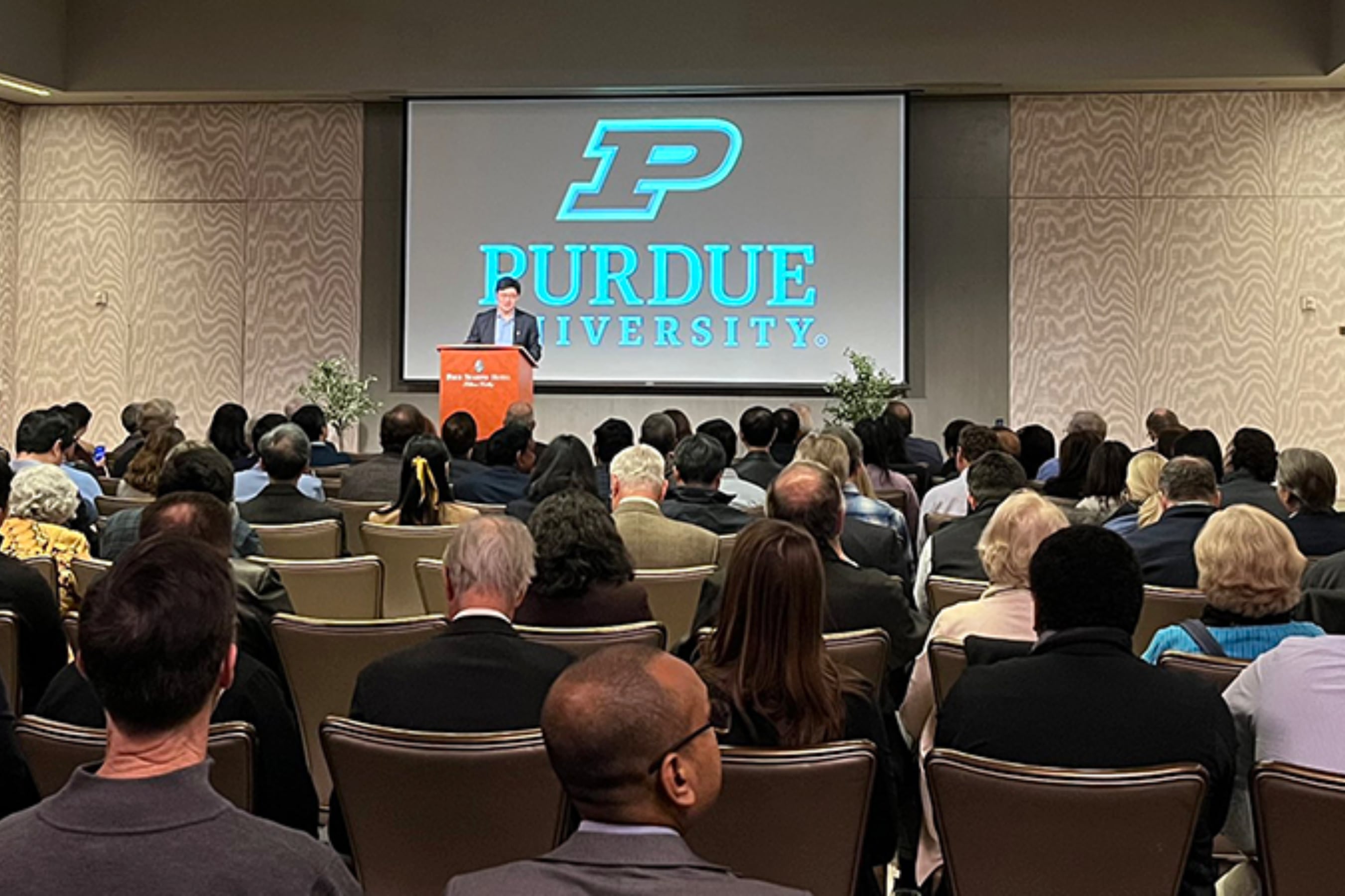 Mung Chiang speaking in lecture hall