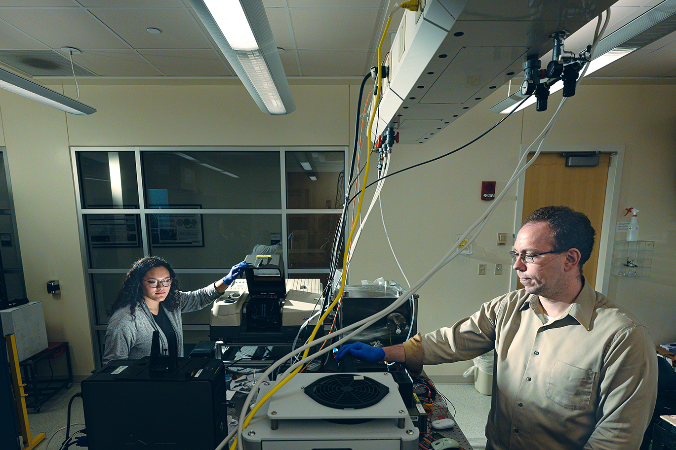 Two people working in research lab
